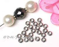 Metallspacer Donut 4mm platin-silber - 100 St�ck