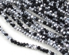 Facettierte Rondelle 2x3mm Jet Half Silver - 1 Strang (ca.200)